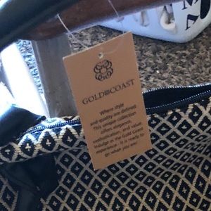 Gold Coast tote/hand bags. Tan and black.